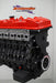 complete engine block with orange rocker cover with white background with logo