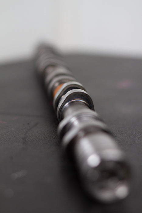 Close-up of a camshaft on a dark background