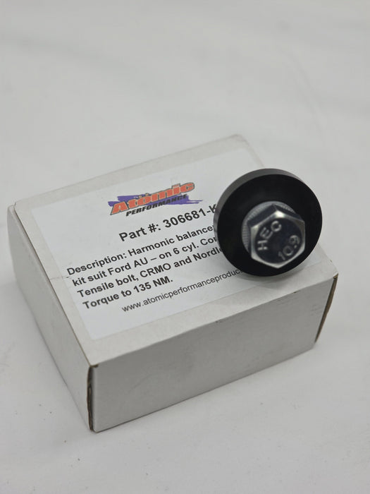 silver hex bolt with nordlock washer and black washer on white box with label and white background