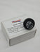 silver hex bolt with nordlock washer and black washer on white box with label and white background