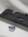 engine rocker cover with plastic cover with black weld on orbs and 3d printed fitting jig with a white background