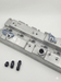 engine rocker cover with weld on fitting kit on a white background