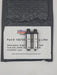 silver and black solid checking lifter on black bubble mailer with label