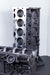 cast engine block on a black surface with a white background