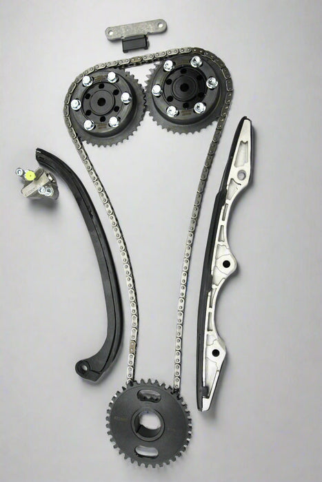 Automotive timing chain set with gears and sprockets on a white background