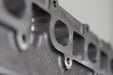 engine cylinder head exhaust port zoomed in with white background