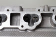 close up of engine cylinder head intake ports