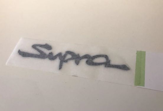 Genuine Toyota JZA80 Supra Gel "Supra" Badge - 75442-14280